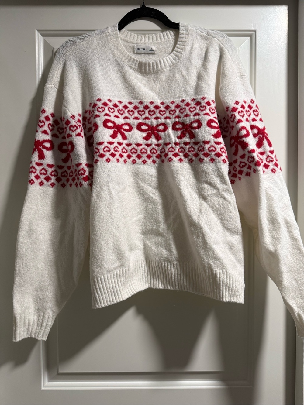 Hollister White Crewneck Sweater with Red Fair Isle Bow Pattern